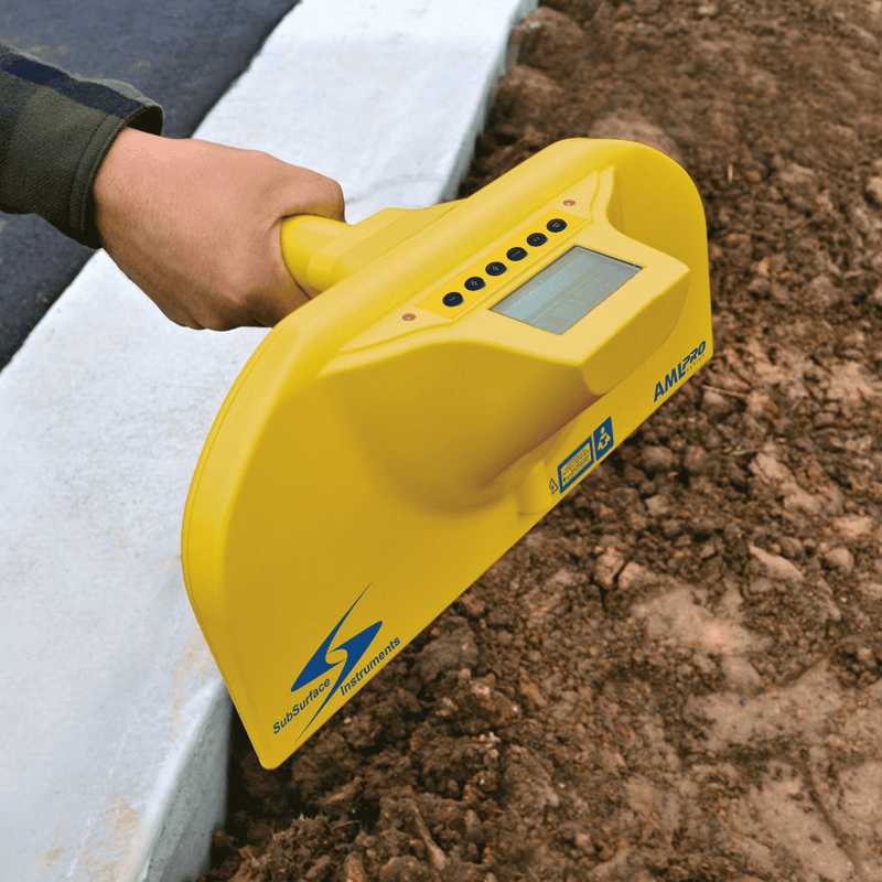 Using the AML Pro on dirt and concrete to locate a buried PVC pipeline