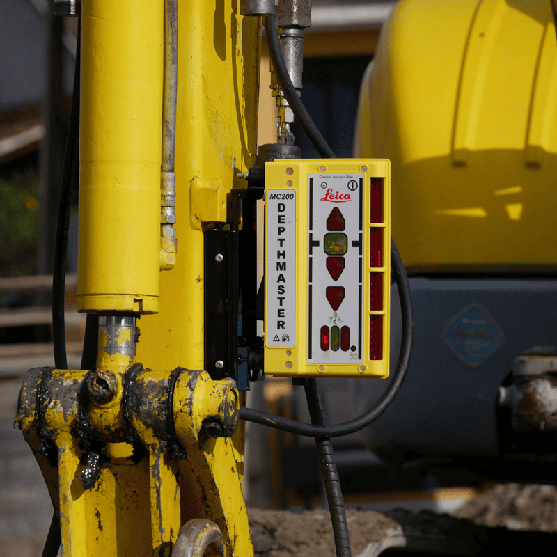 Leica MC200 Depthmaster Machine Laser Receiver attached to backhoe boom