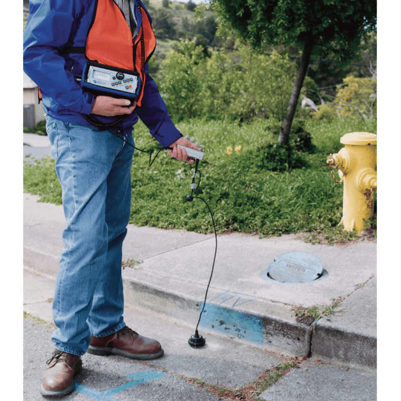 LD-12 Water Leak Detector Finding Water Leak on pavement